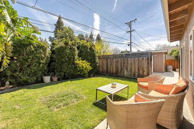a front view of a house with yard