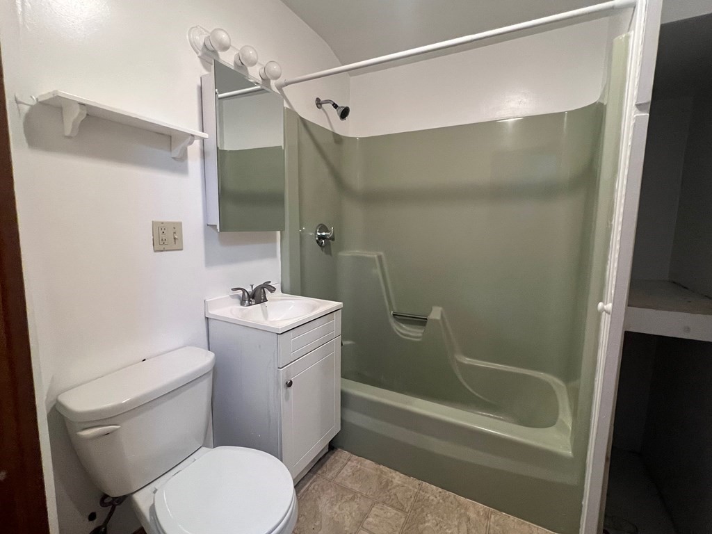 178 Larch Road Cambridge, MA 02138 - Photo 13 of 15 a bathroom with a sink a toilet and shower