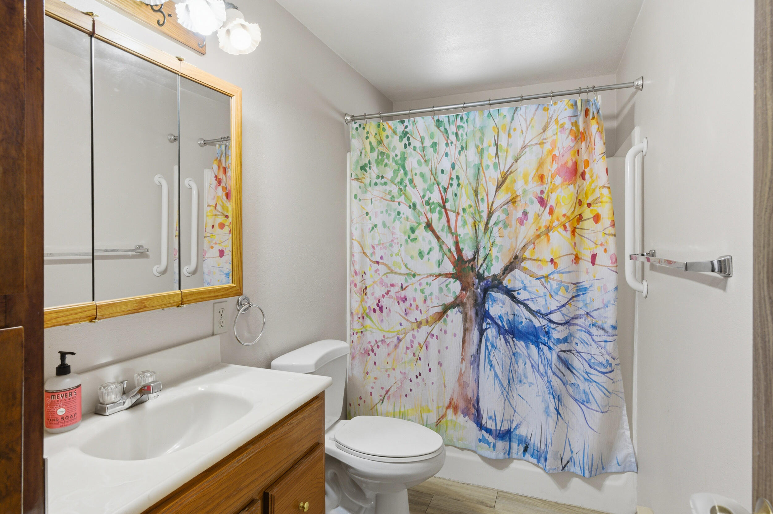 50868 Doe Loop La Pine, OR 97739 - Photo 19 of 51 a bathroom with a sink mirror vanity and toilet