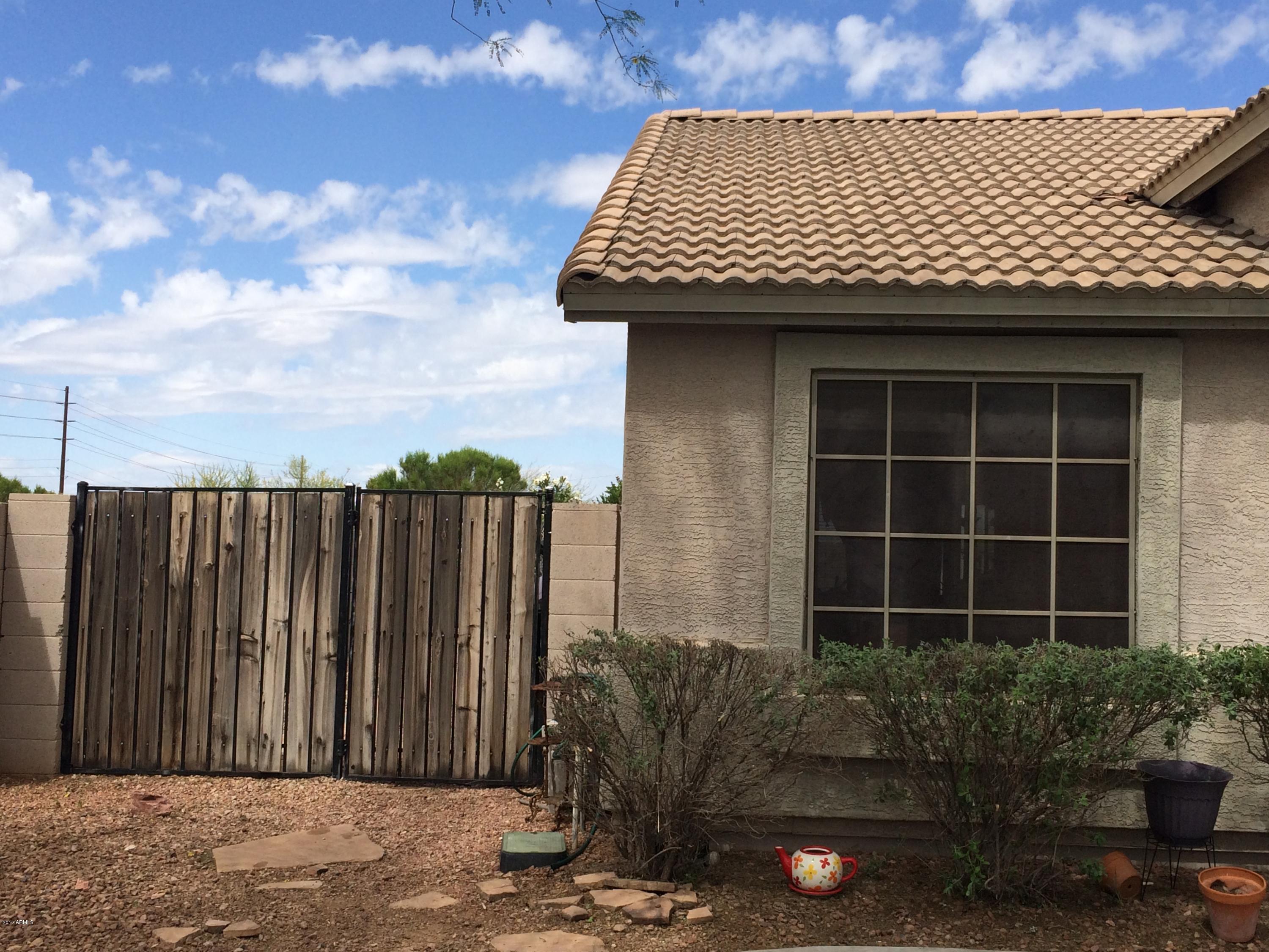 1406 West Darrel Road Phoenix, AZ 85041 - Photo 3 of 30 Side gate RV-1406 W Darrel Rd Phoenix Az