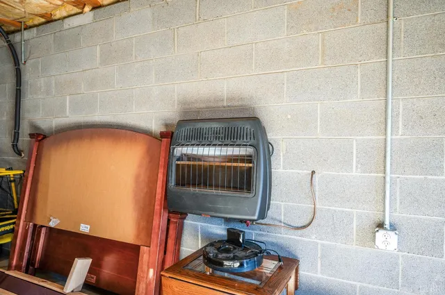 a view of a pathway with a wrought fence