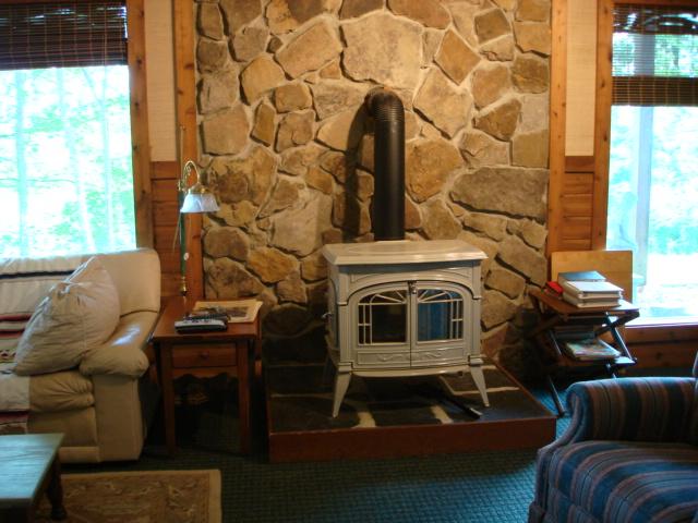 7270 Solonevich Road Roanoke, VA 24018 - Photo 19 of 20 Downstairs Wood stove in Family Rm.