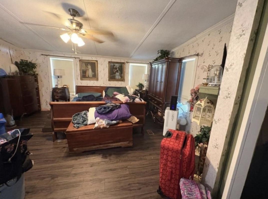 5249 Big Oak Road South St. Augustine, FL 32095 - Photo 17 of 20 a living room with furniture and a flat screen tv