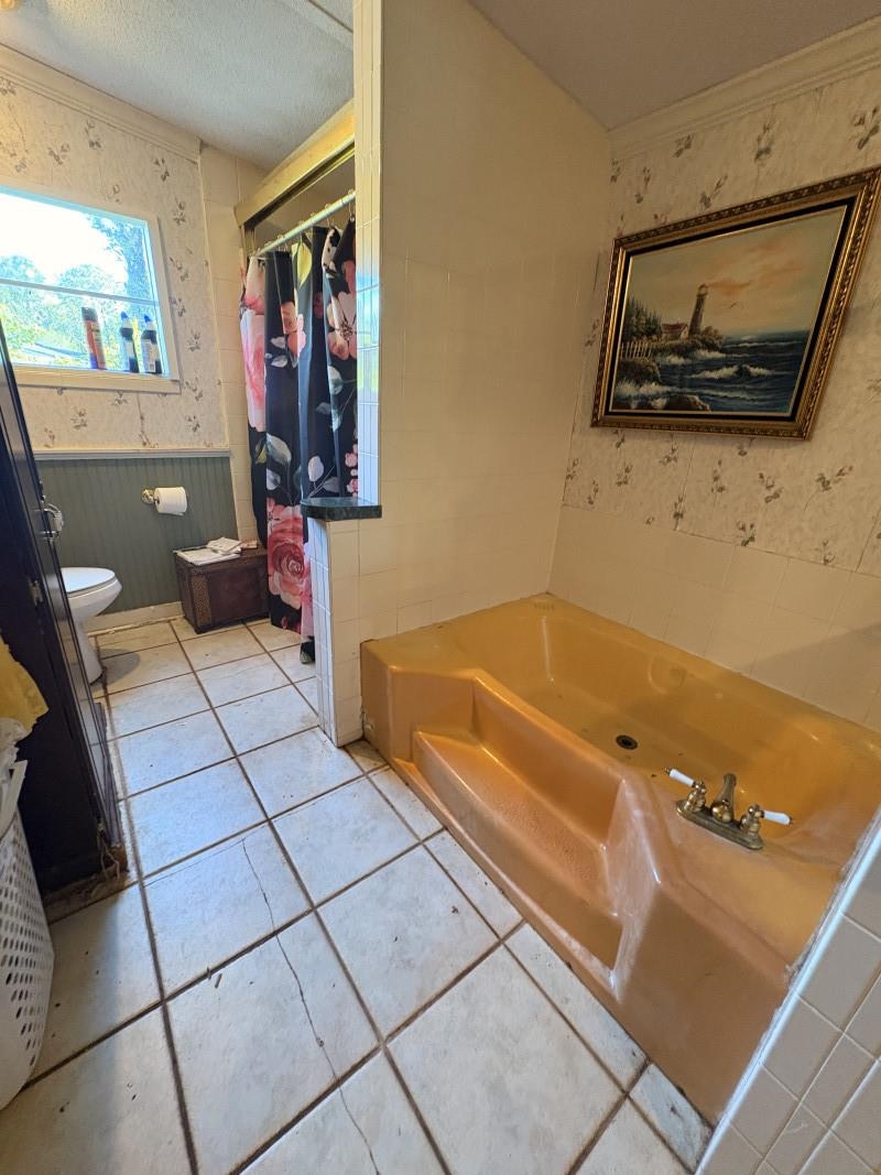 5249 Big Oak Road South St. Augustine, FL 32095 - Photo 20 of 20 a bathroom with a bathtub and shower