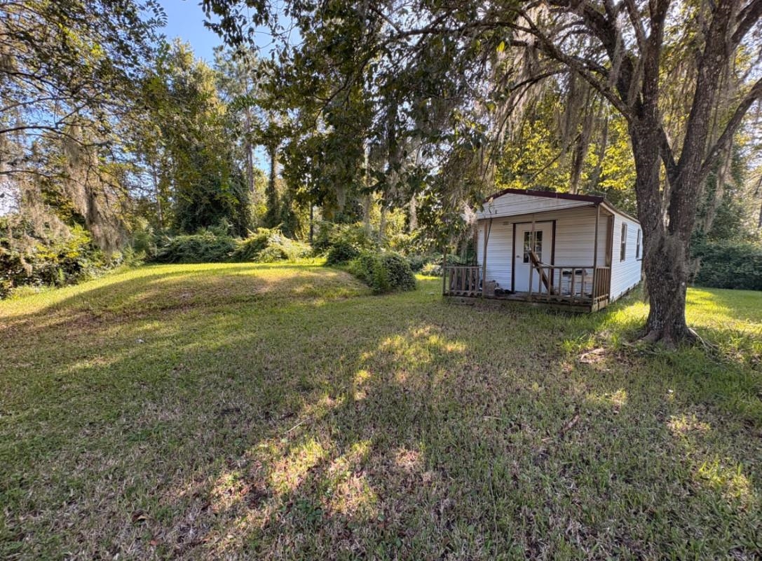 5249 Big Oak Road South St. Augustine, FL 32095 - Photo 7 of 20 a view of a house with a yard