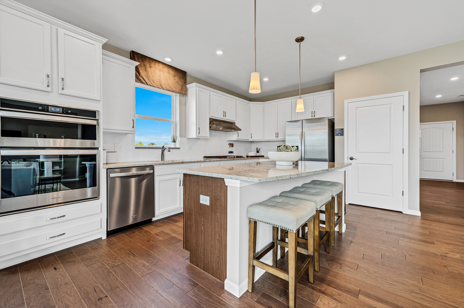 816 Summer Lane Lindenhurst, IL 60046 - Photo 2 of 12 a kitchen with stainless steel appliances a stove a sink a refrigerator and a microwave