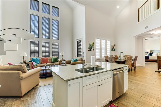 a living room with furniture and a table