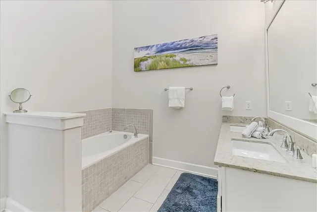 a bathroom with a sink and a bathtub
