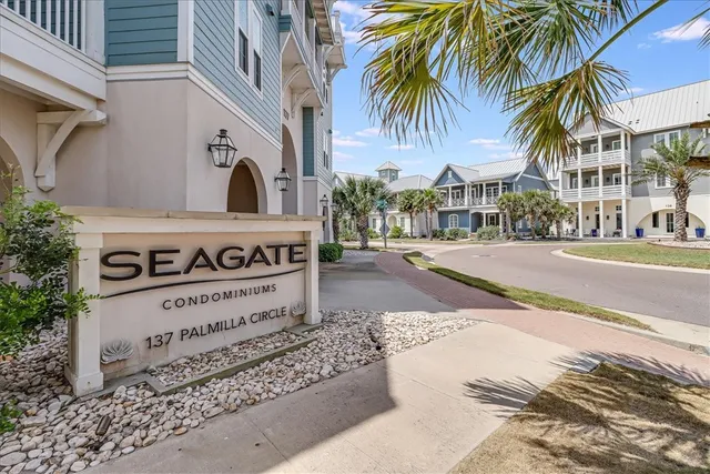 a view of a and white house with a park
