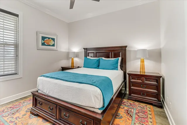 a bedroom with a bed and a dresser