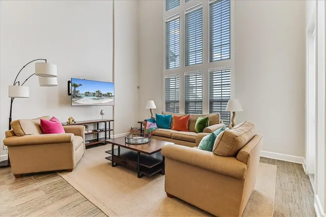 a living room with furniture and a window