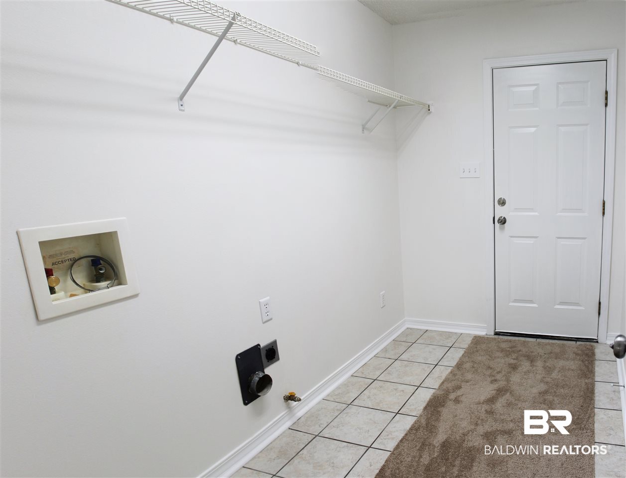 8522 Southern Oak Court Mobile, AL 36695 - Photo 16 of 21 Access to garage & plenty of shelving for storage