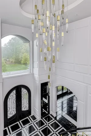 a view of a patio with table and chairs