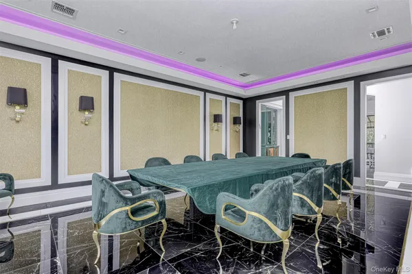 a view of a dining table and chairs in the patio