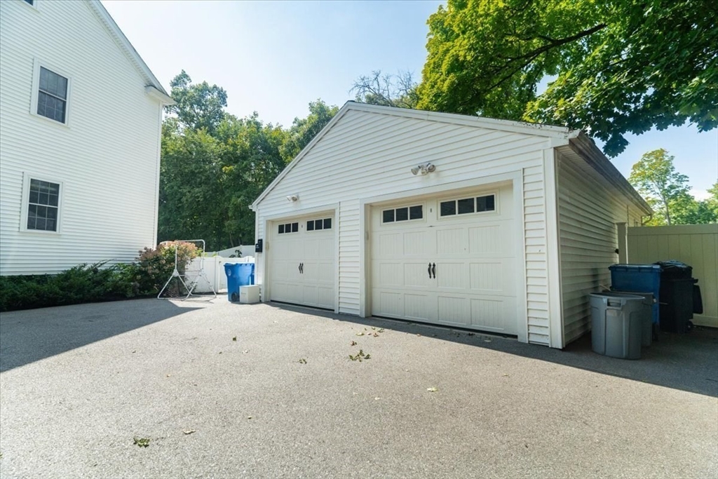 132 Church Street, Unit 1 Waltham, MA 02452 - Photo 33 of 42 a backyard of a house