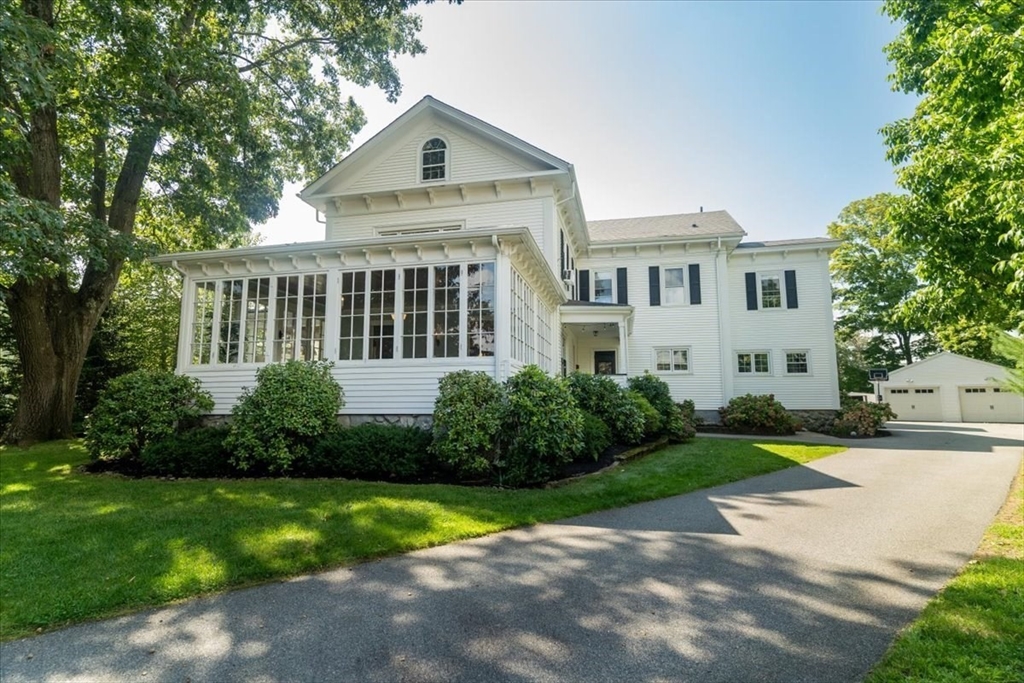 132 Church Street, Unit 1 Waltham, MA 02452 - Photo 42 of 42 a front view of a house with garden