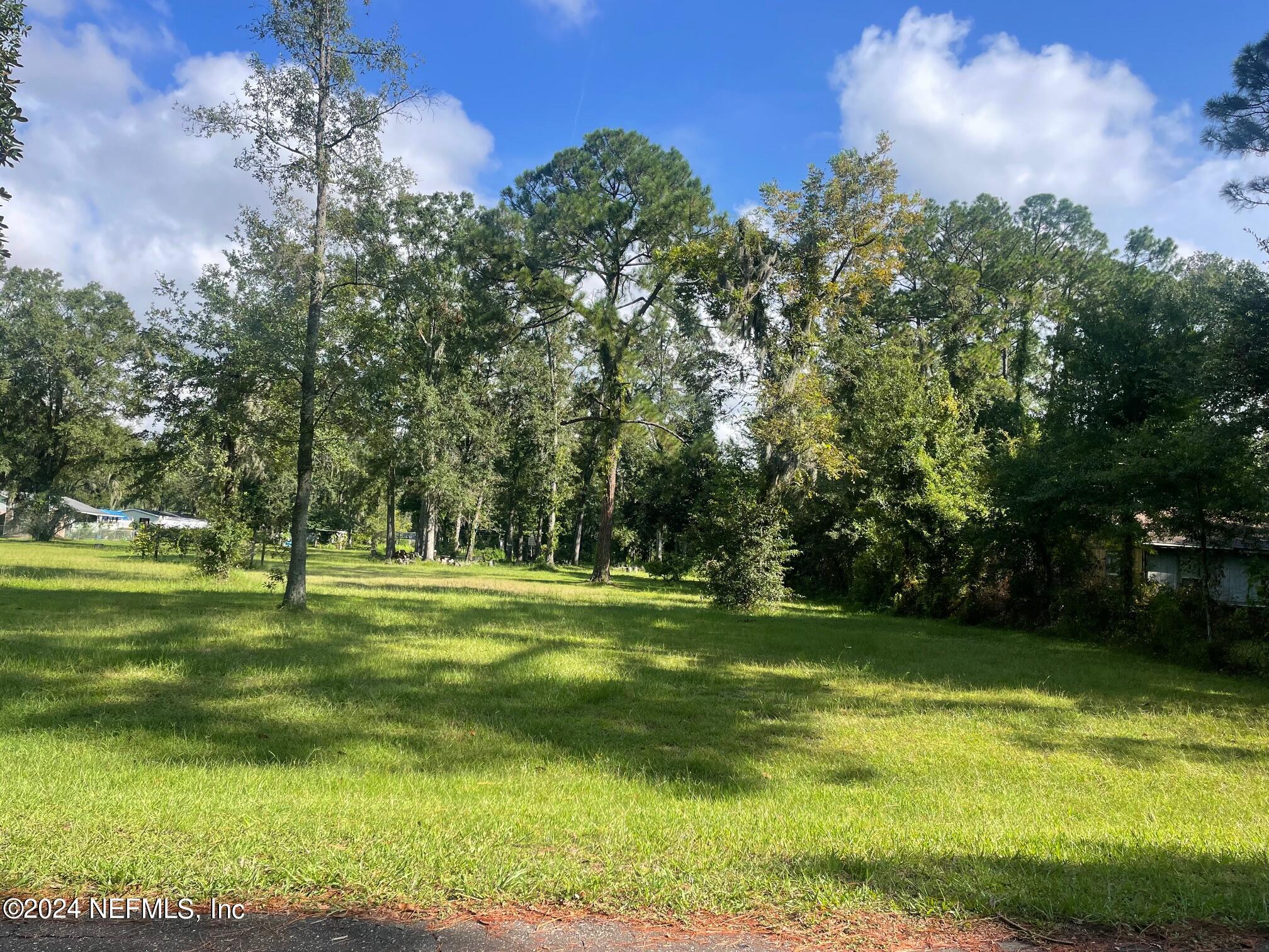 0 Maude Road Jacksonville, FL 32254 - Photo 6 of 8 a view of a golf course with a garden