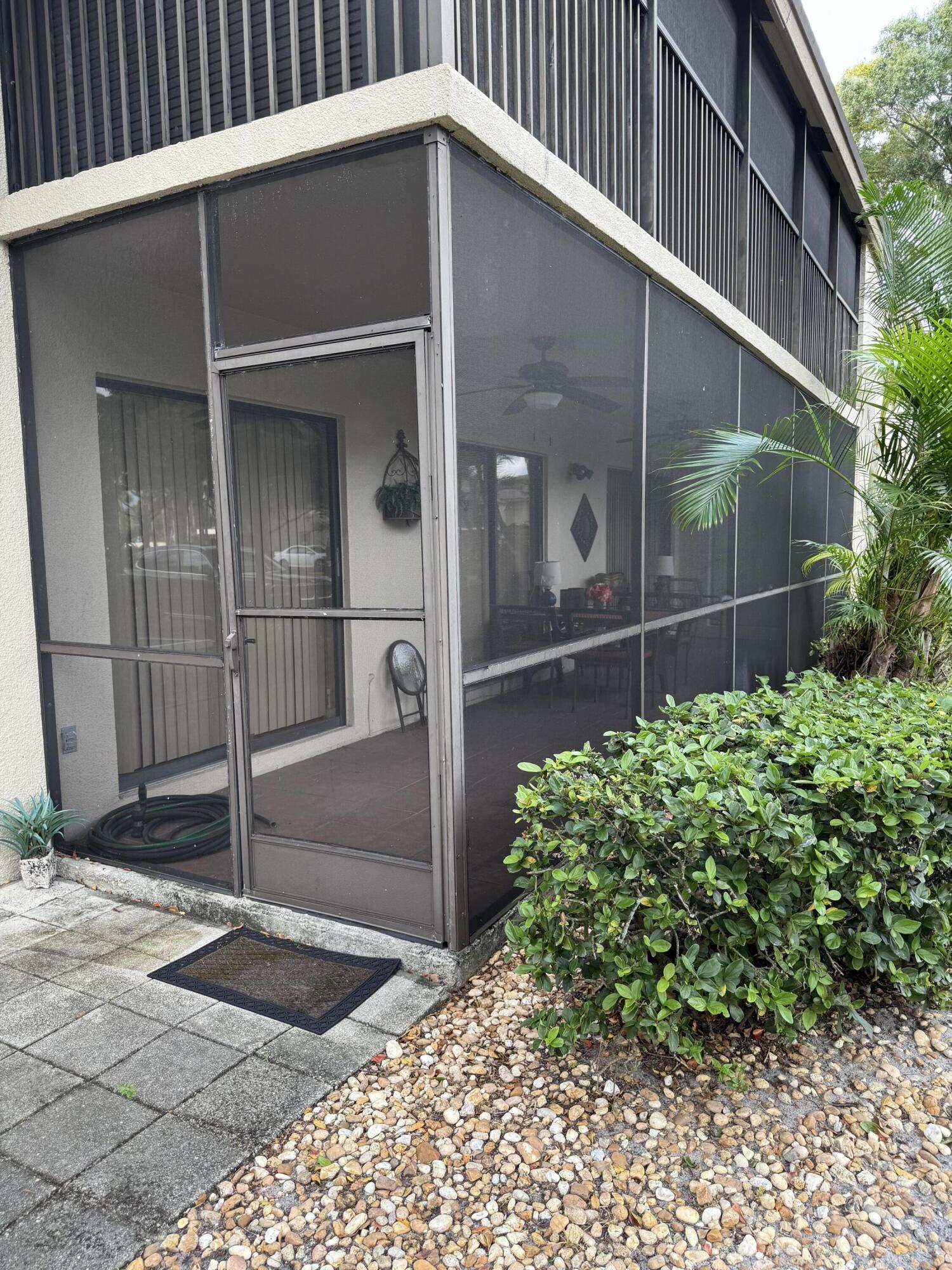 147 Deer Creek Boulevard, Unit 402 Deerfield Beach, FL 33442 - Photo 49 of 81 a backyard of a house