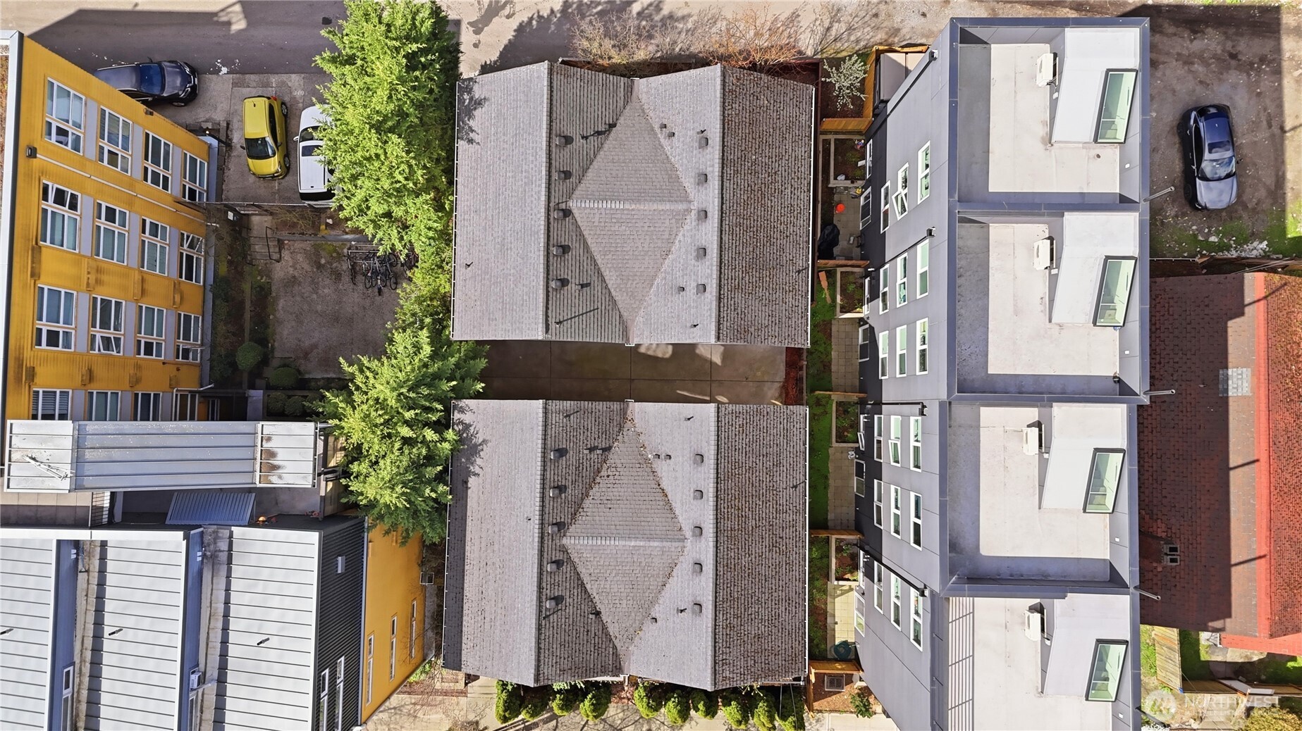 4037 7th Avenue Northeast, Unit A Seattle, WA 98105 - Photo 35 of 35 an aerial view of residential houses with outdoor space