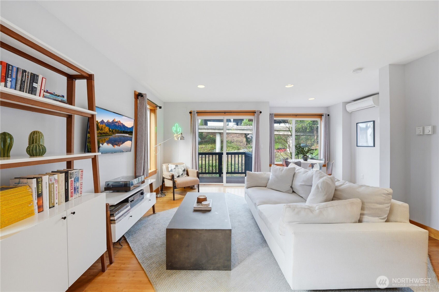 4037 7th Avenue Northeast, Unit A Seattle, WA 98105 - Photo 4 of 35 a living room with furniture and a large window