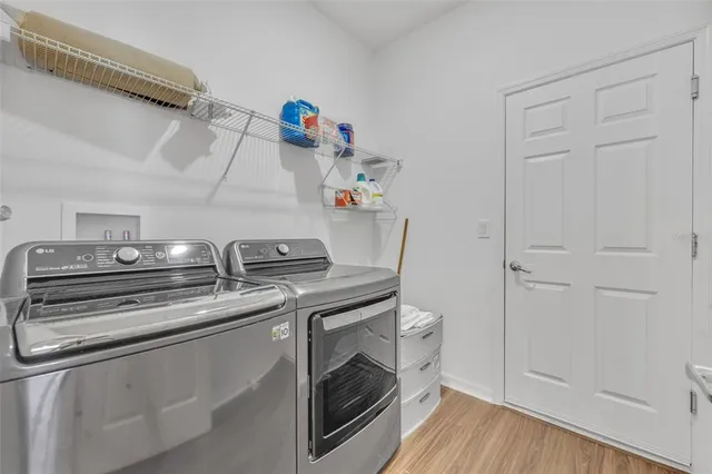 a utility room with dryer and washer