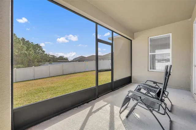 a view of a large window and an outdoor space