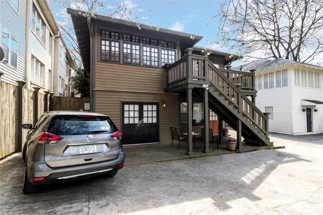 a car parked in front of a house
