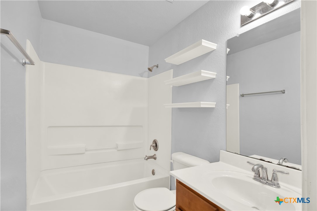 117 Bashaw Loop Temple, TX 76502 - Photo 20 of 20 a bathroom with a sink toilet and shower
