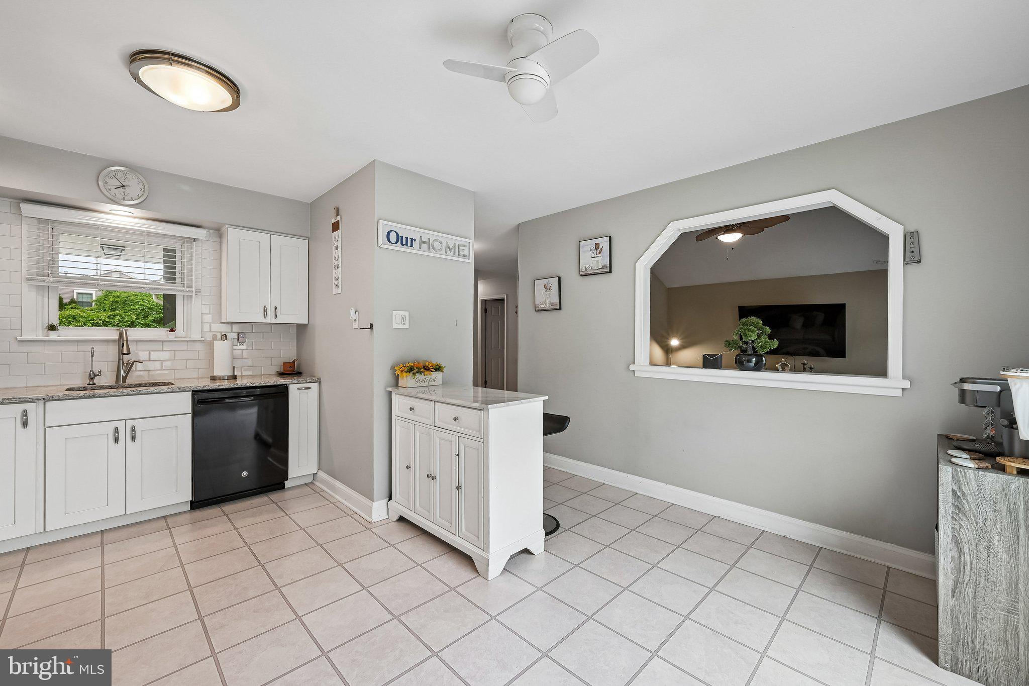 11 Old Mill Road Sewell, NJ 08080 - Photo 14 of 25 a kitchen with cabinets and window