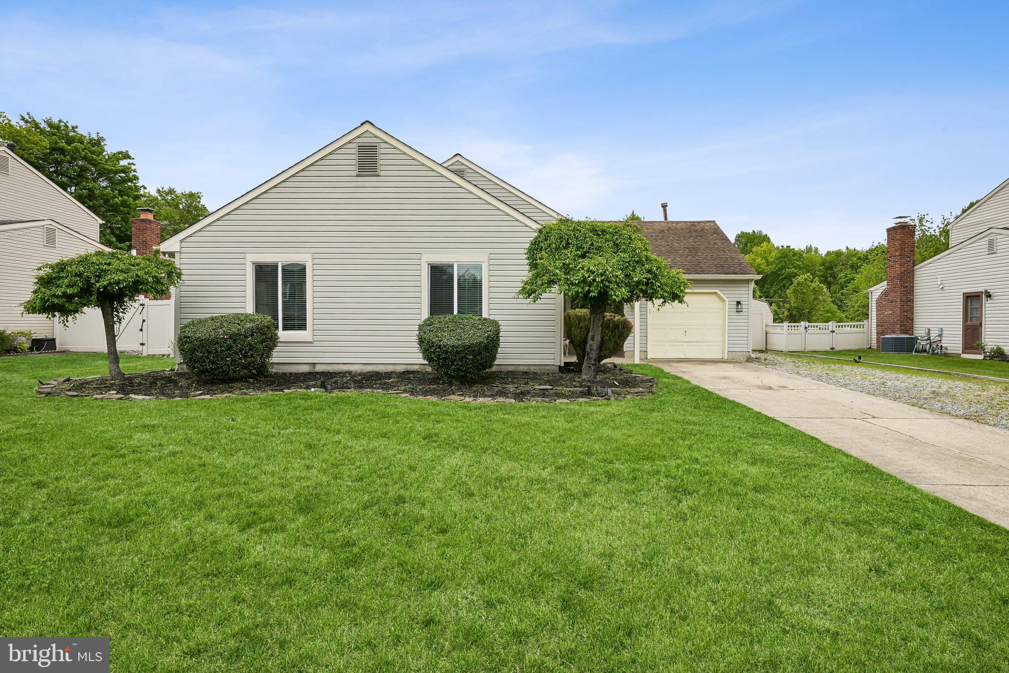 11 Old Mill Road Sewell, NJ 08080 - Photo 2 of 25 a front view of house with yard and green space