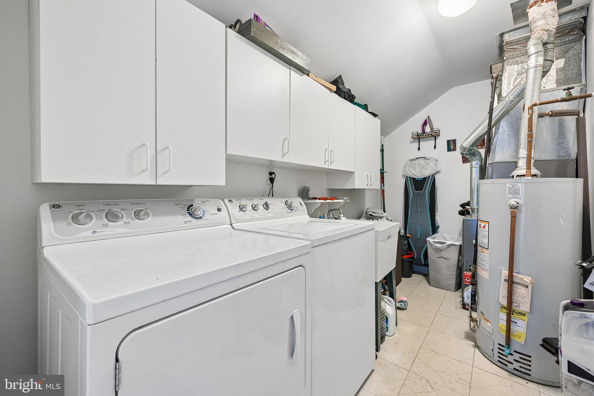 11 Old Mill Road Sewell, NJ 08080 - Photo 22 of 25 a utility room with dryer and washer