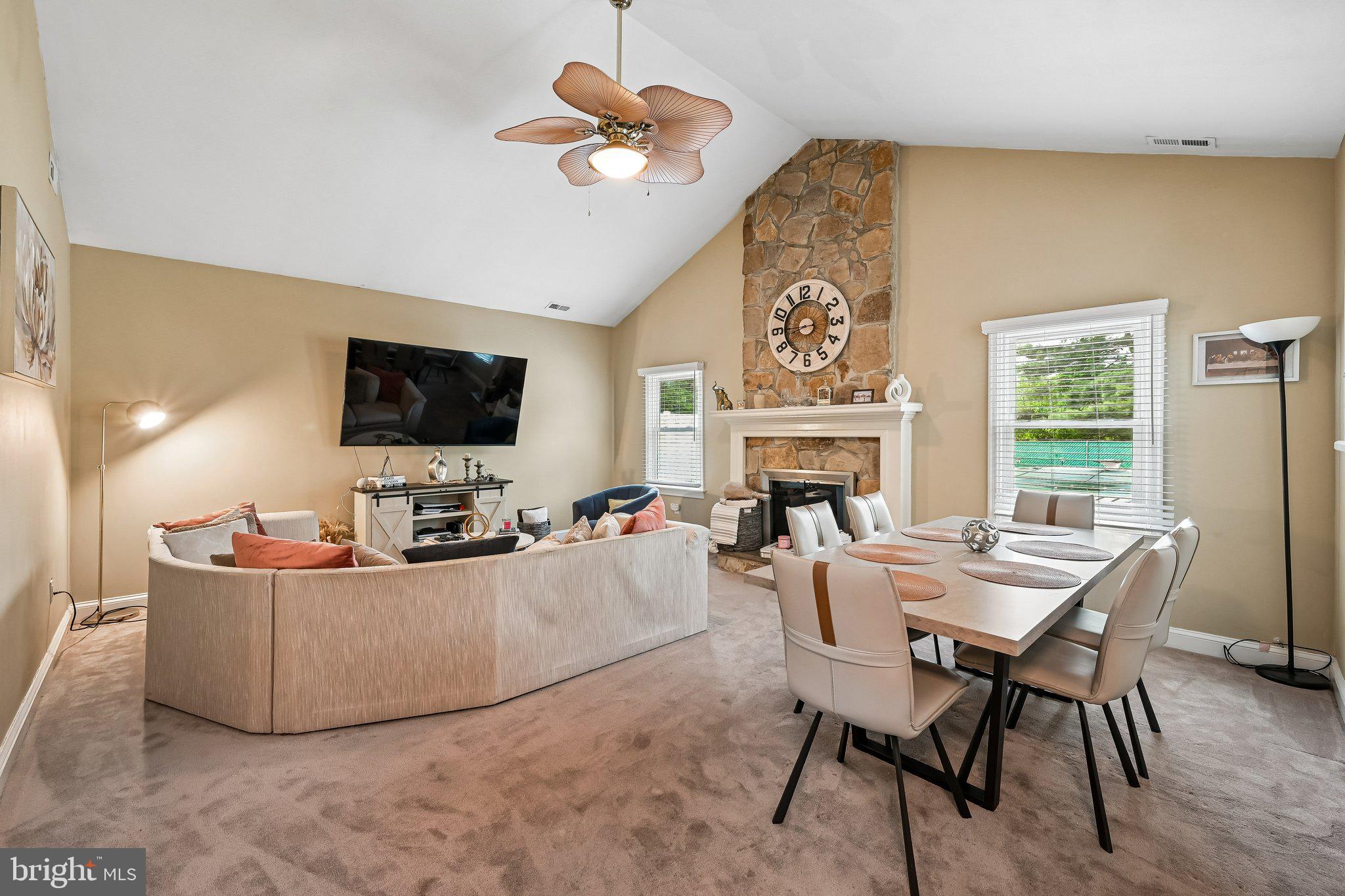 11 Old Mill Road Sewell, NJ 08080 - Photo 7 of 25 a living room with furniture a fireplace and a flat screen tv