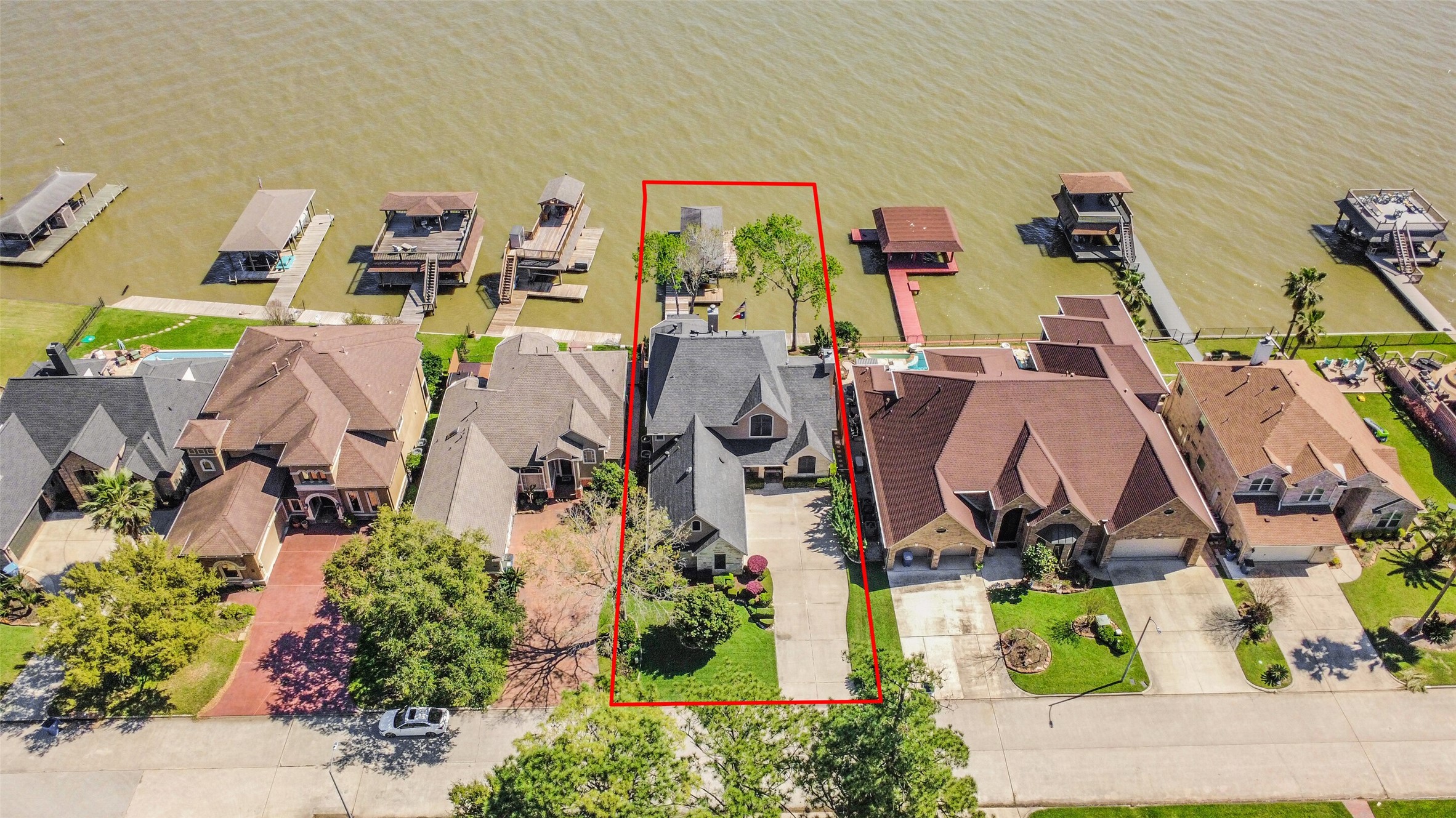 This is a rare opportunity to own a stunning, custom-reimagined luxury home in the prestigious Walden on Lake Houston