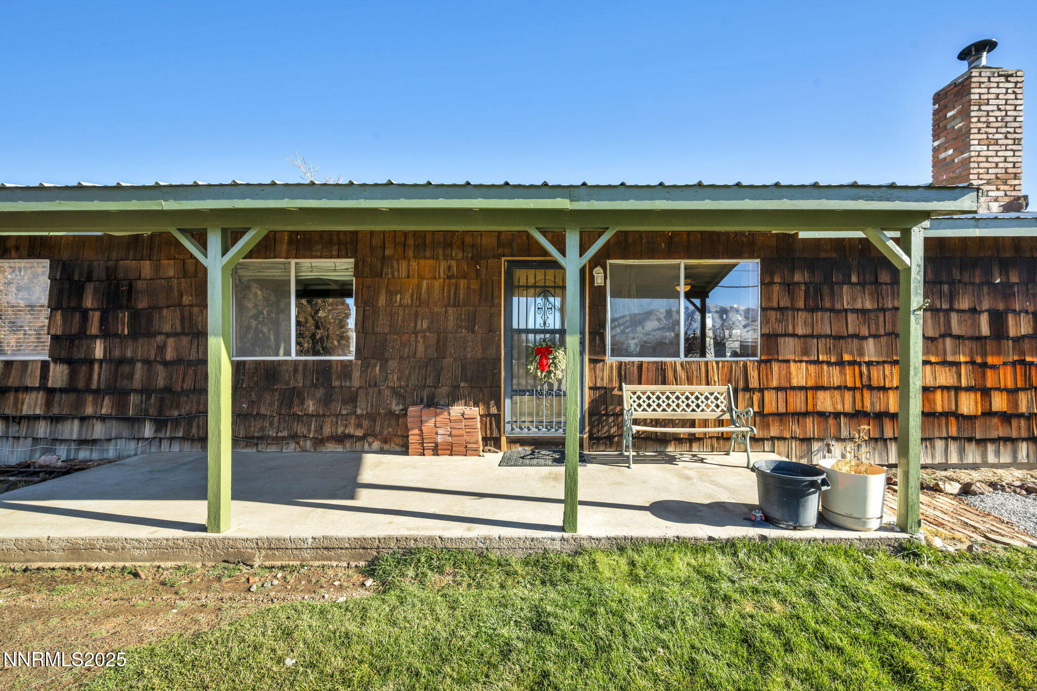 a view of a water fountain and a floor to ceiling window