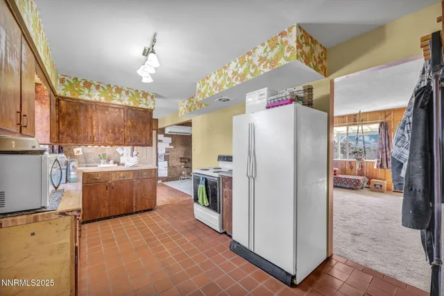 a workspace with furniture and book shelf