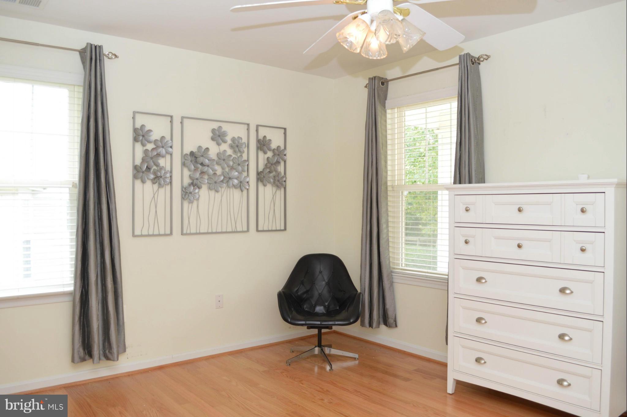 703 Merry Go Round Way Mount Airy, MD 21771 - Photo 12 of 27 a bedroom with a bed and a window