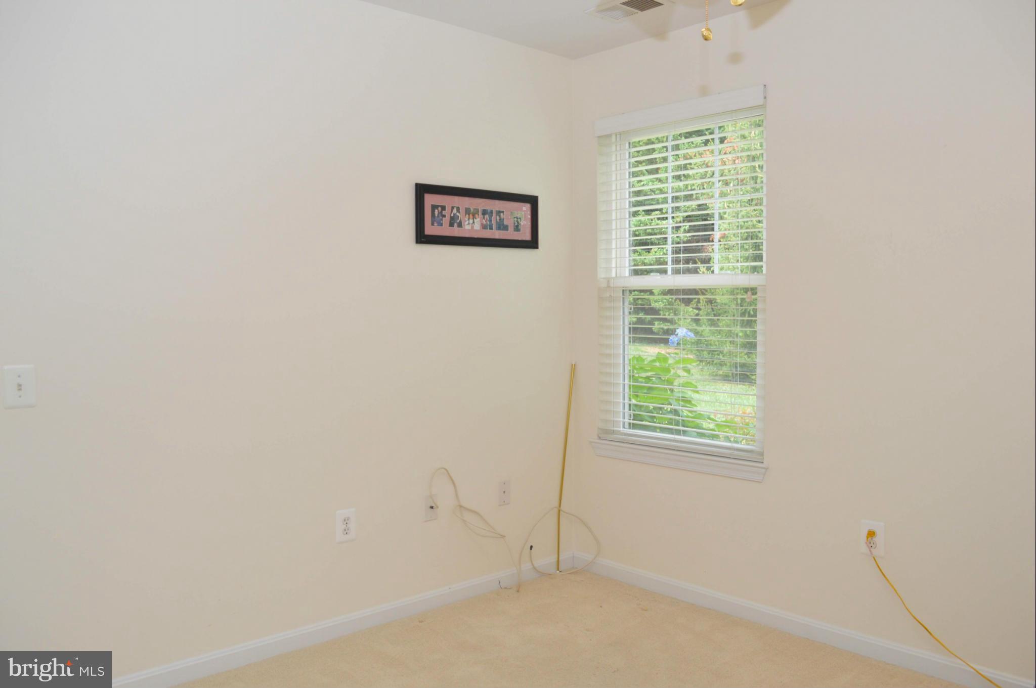 703 Merry Go Round Way Mount Airy, MD 21771 - Photo 17 of 27 a view of an empty room with a window