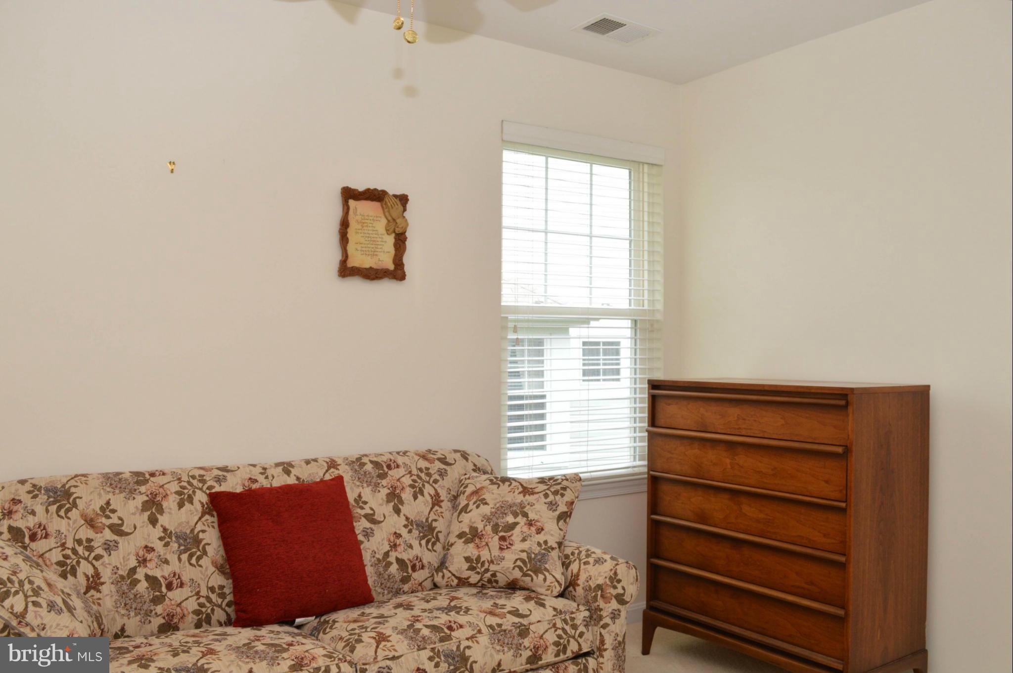 703 Merry Go Round Way Mount Airy, MD 21771 - Photo 19 of 27 a bedroom with a bed and a window