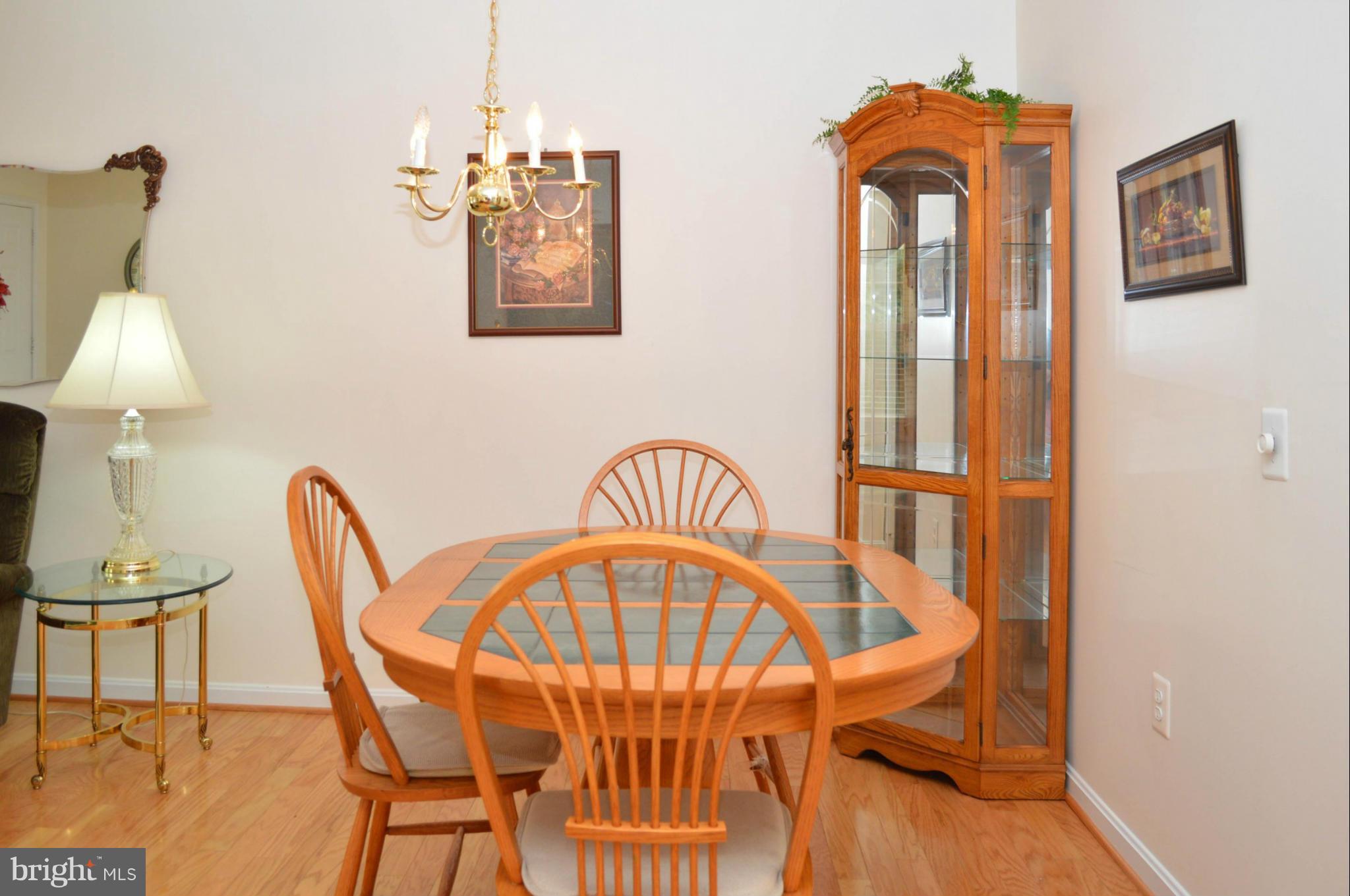 703 Merry Go Round Way Mount Airy, MD 21771 - Photo 5 of 27 a view of a dining room with furniture and wooden floor