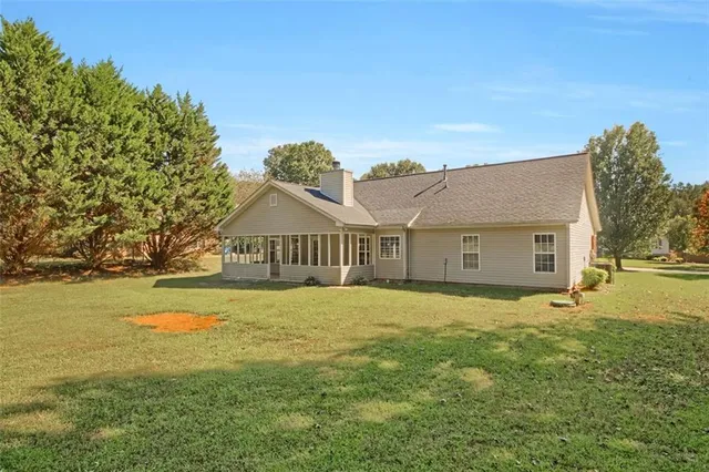 a house with yard in front of it