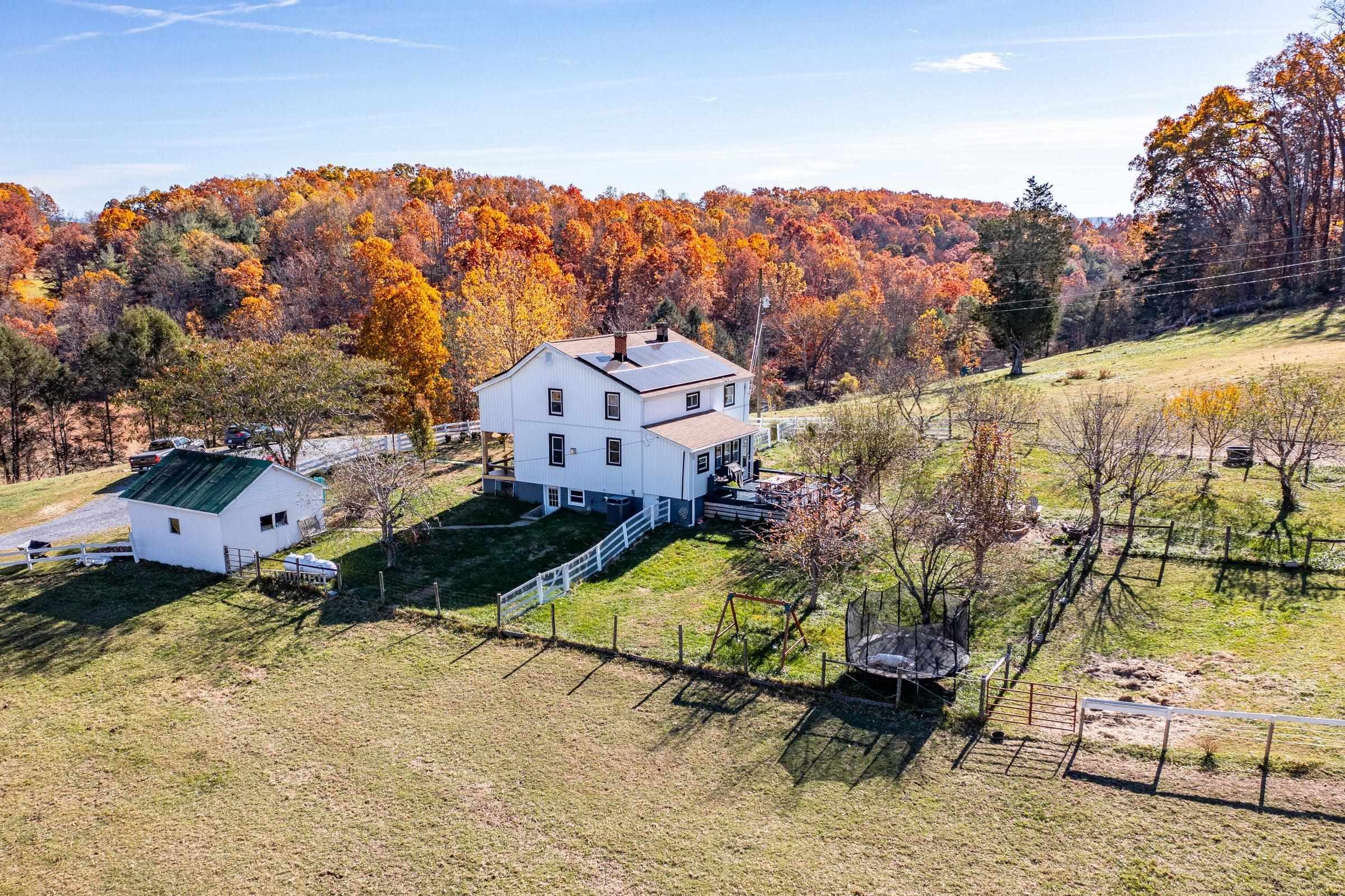 75 Margarets Lane Lexington, VA 24450 - Photo 51 of 55 an aerial view of a house with a garden and mountain view
