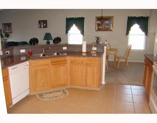 2602 Whirlwind Street Corpus Christi, TX 78414 - Photo 4 of 7 a kitchen with a sink and a cabinets