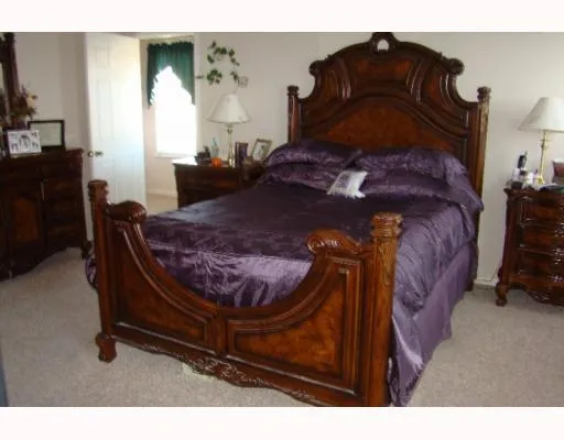 a living room with a bed