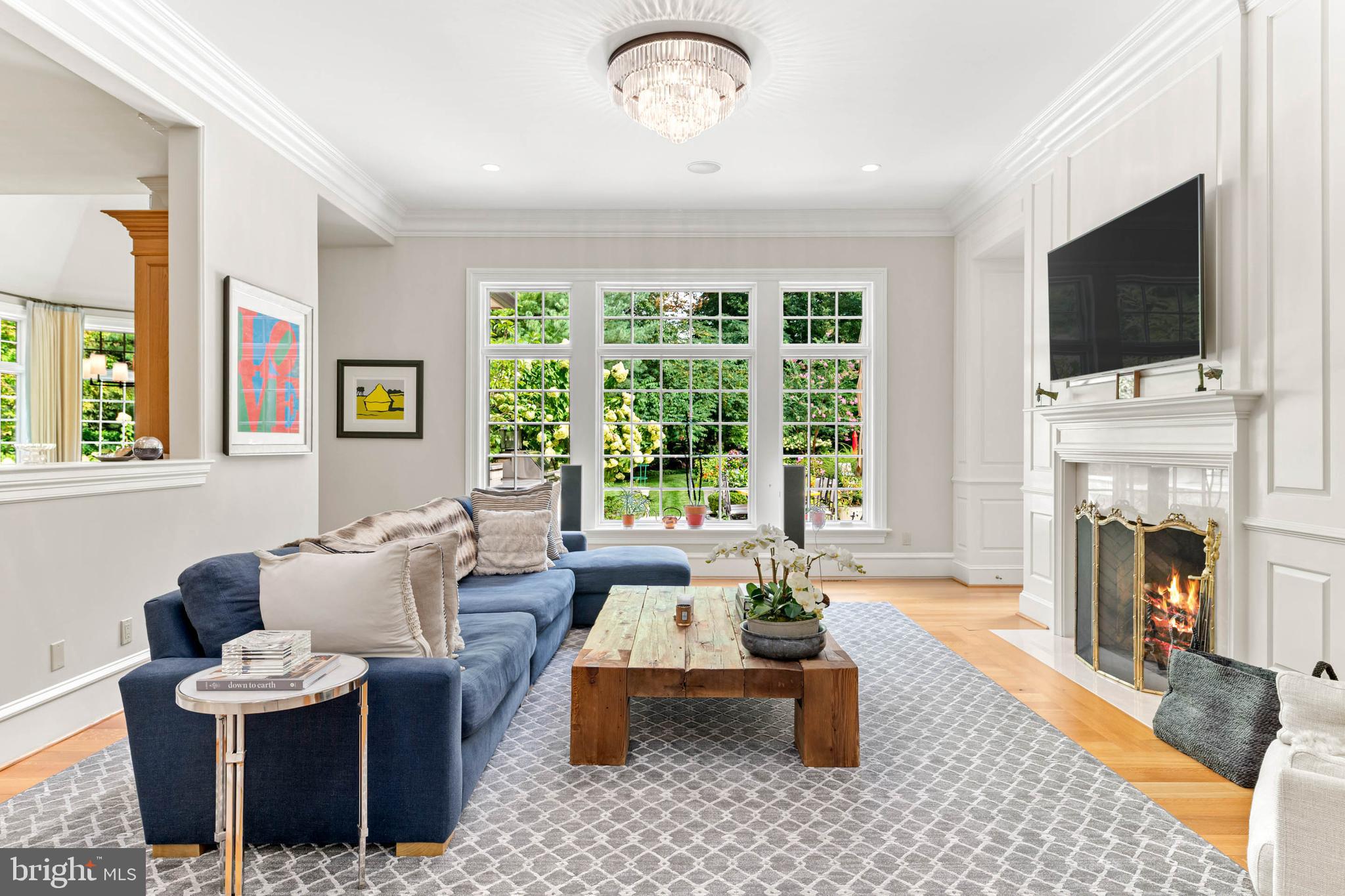 545 Avonwood Road Haverford, PA 19041 - Photo 32 of 86 a living room with furniture a fireplace and a flat screen tv