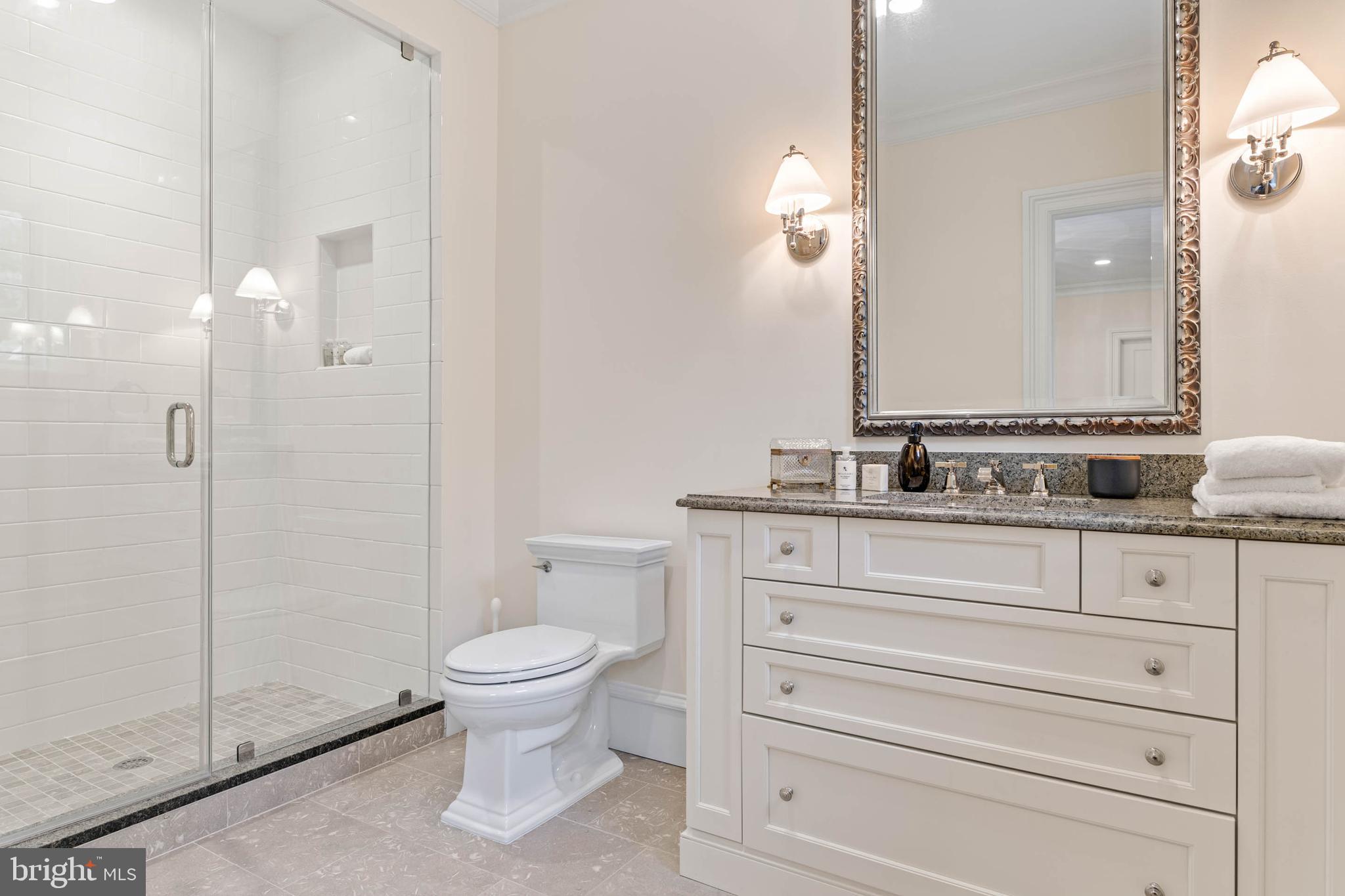 545 Avonwood Road Haverford, PA 19041 - Photo 56 of 86 a bathroom with a granite countertop toilet sink and mirror