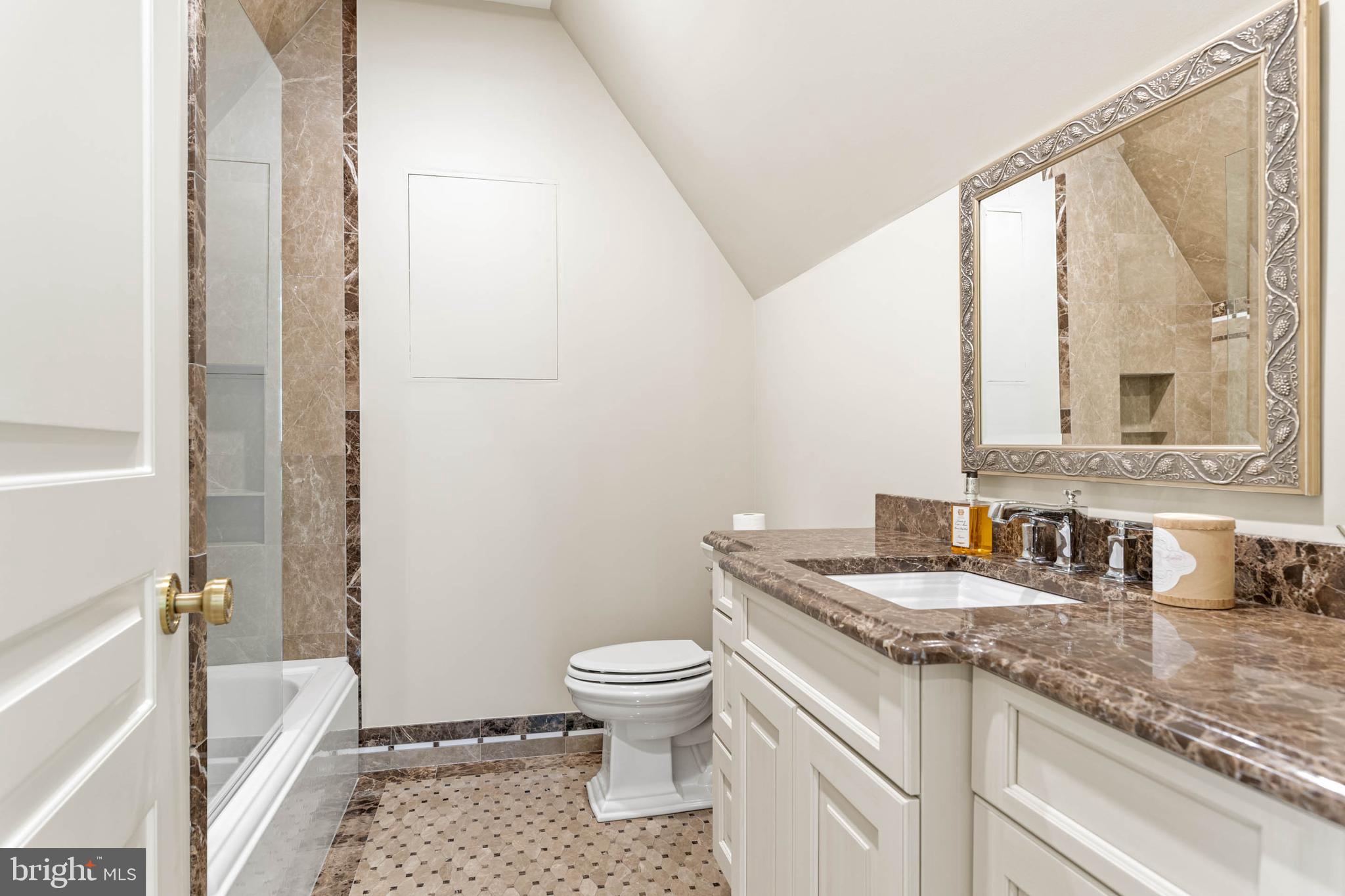 545 Avonwood Road Haverford, PA 19041 - Photo 64 of 86 a bathroom with a granite countertop sink mirror vanity and toilet