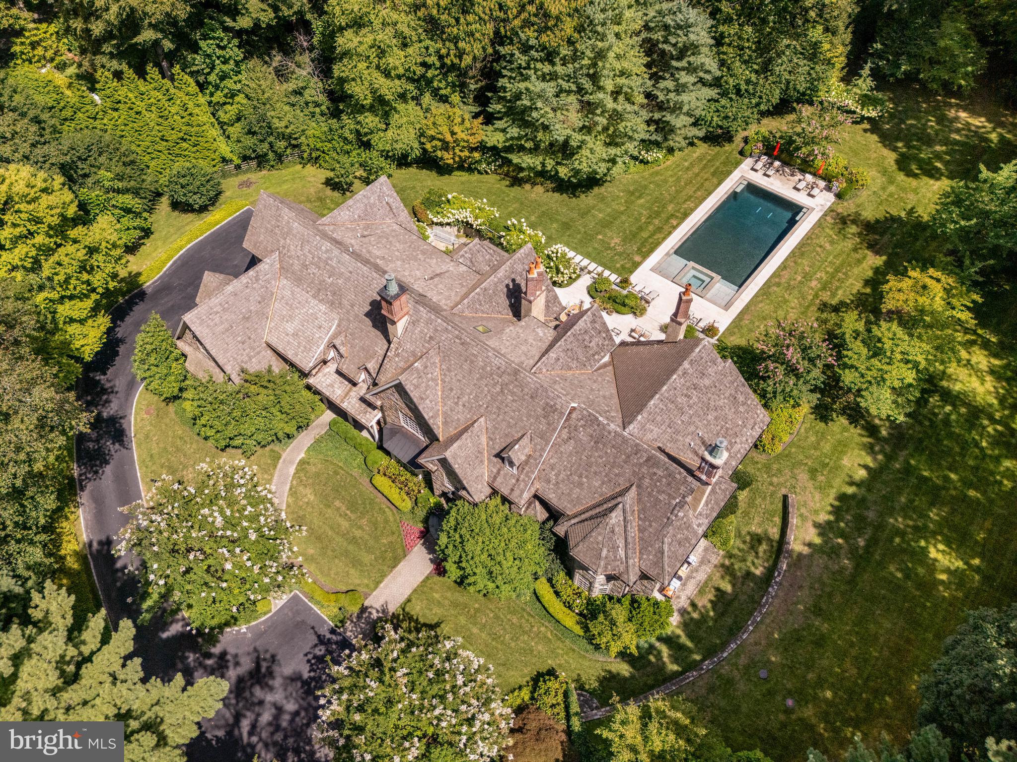 545 Avonwood Road Haverford, PA 19041 - Photo 86 of 86 an aerial view of a house with a yard and trees