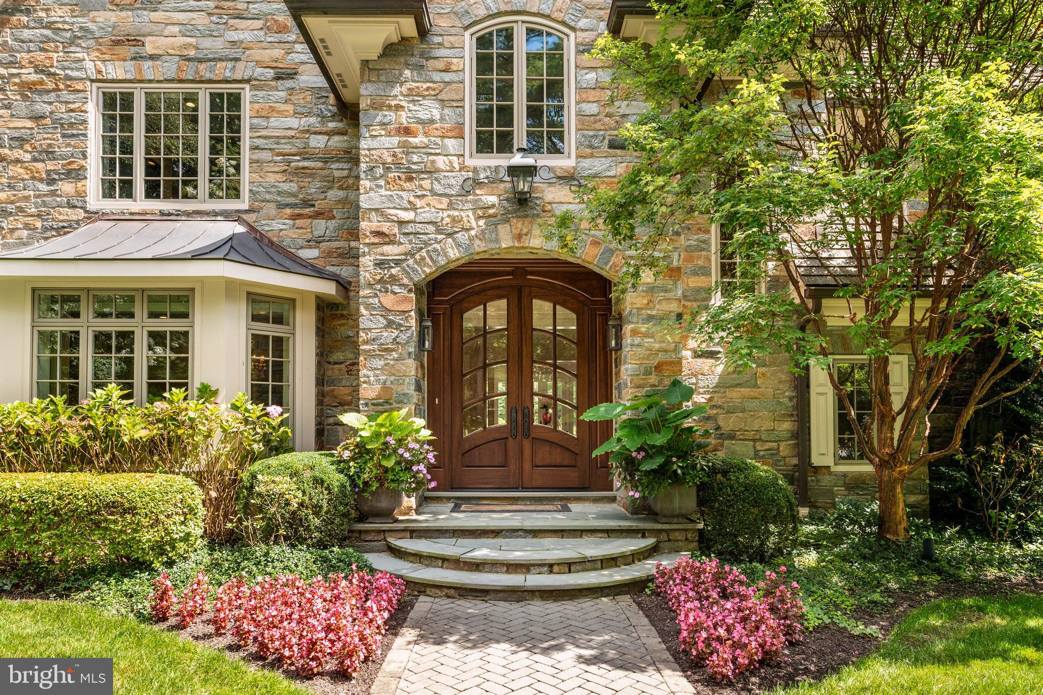 545 Avonwood Road Haverford, PA 19041 - Photo 9 of 86 a front view of a house with a garden