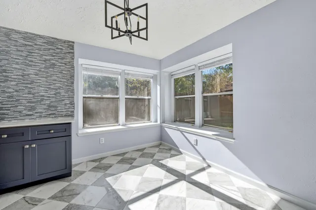 a view of a livingroom with a large window
