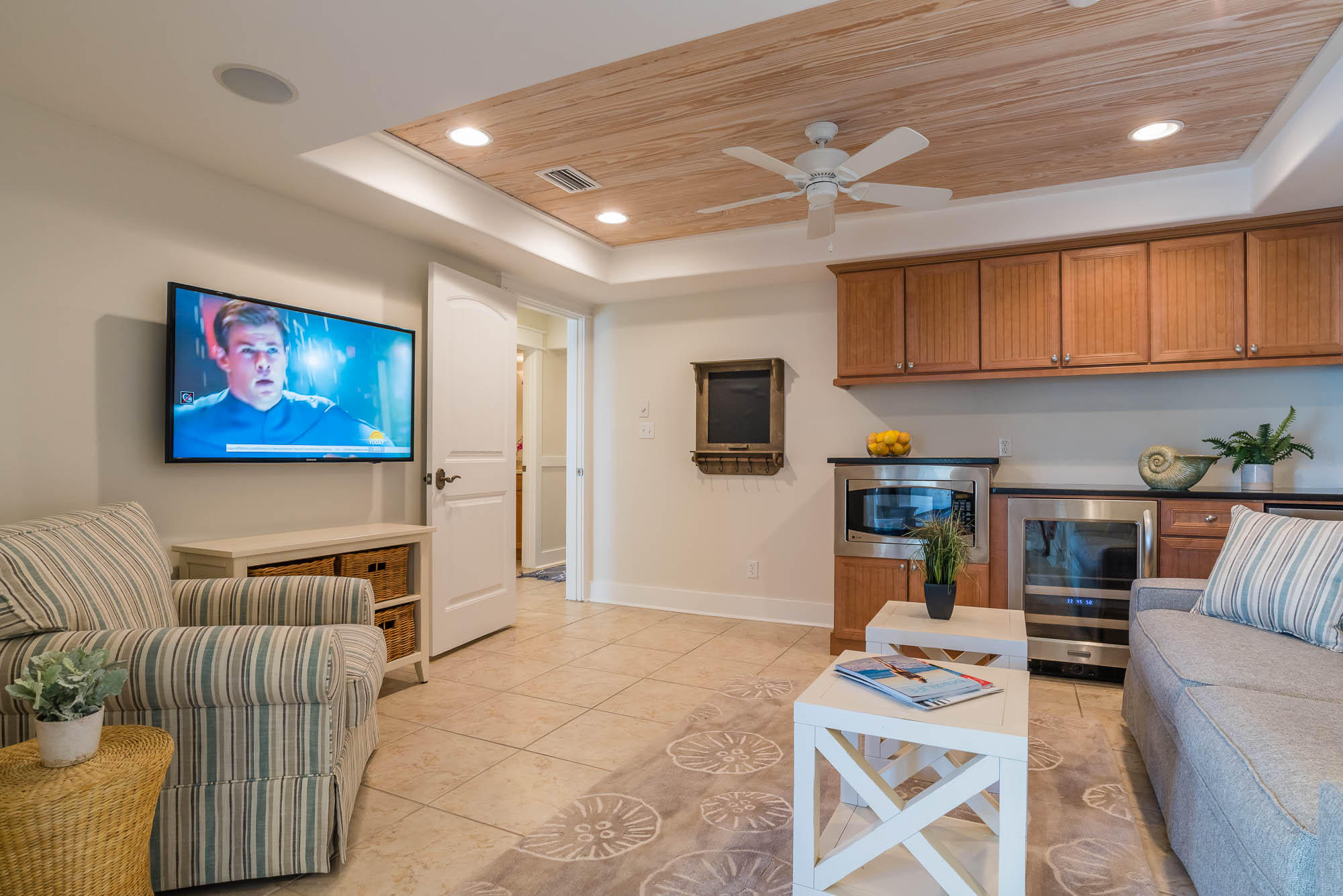 179 Pelican Circle Seacrest, FL 32461 - Photo 17 of 87 a living room with furniture and a flat screen tv